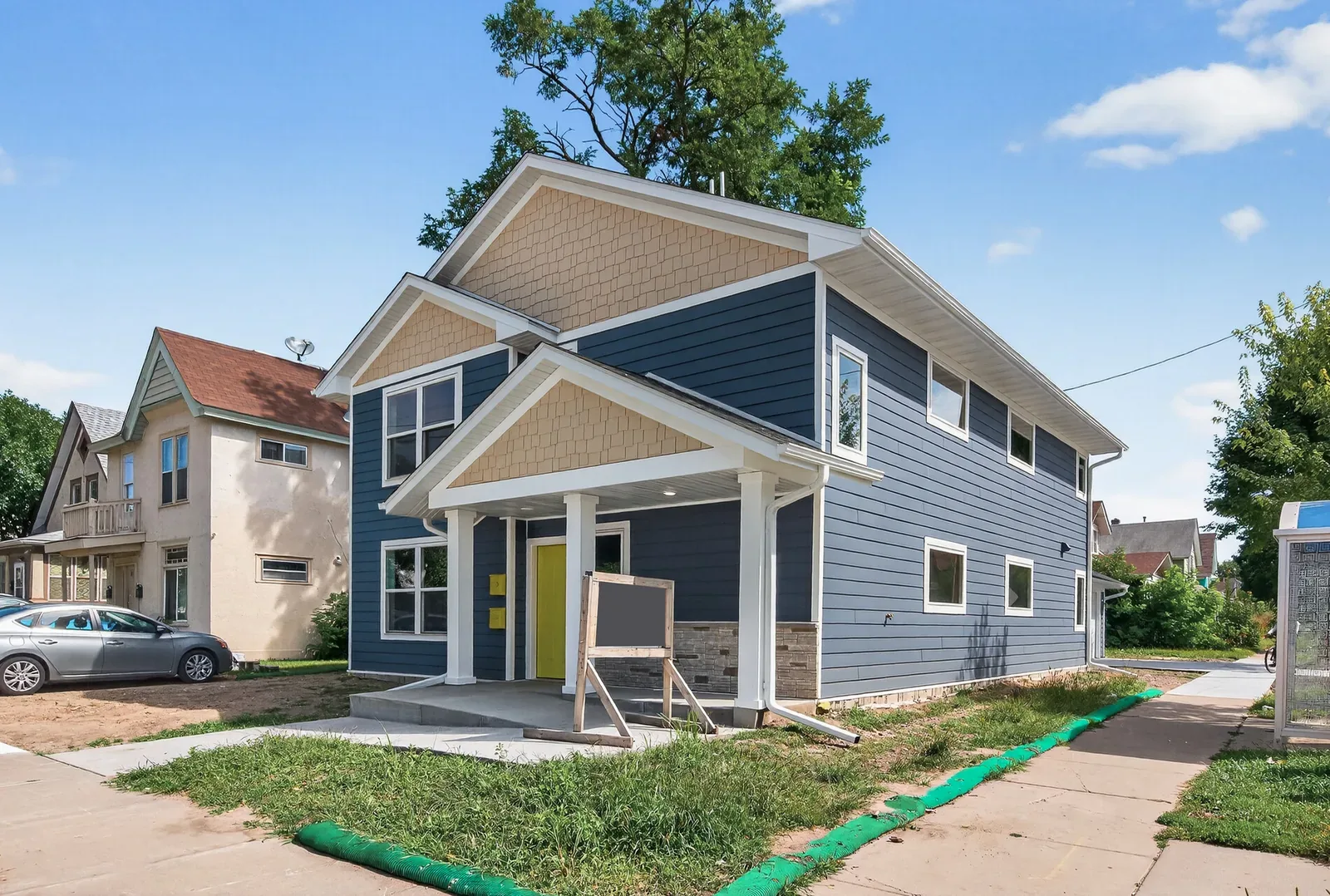 A Due North Equity crew member working on a Minnesota home