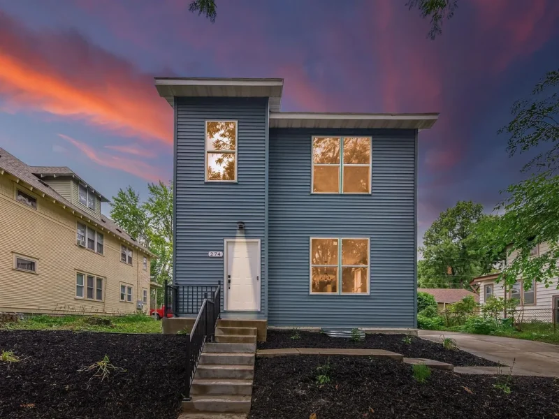 The duplex from the front at dusk