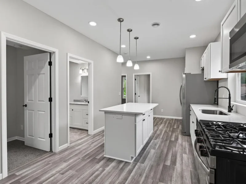 Kitchen island with a view through to the bathroom