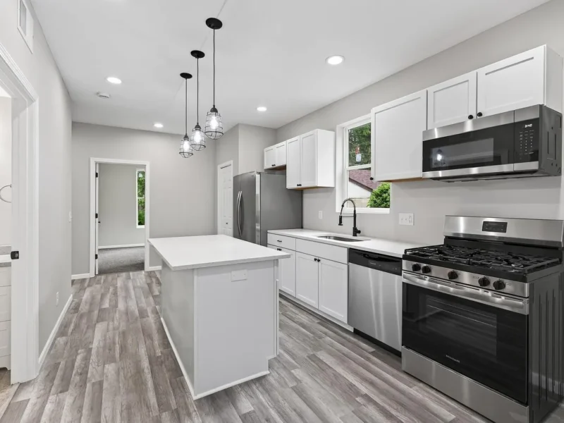 Kitchen with a microwave, range and island