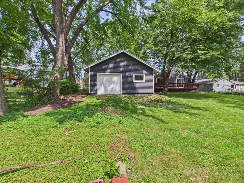 Rear yard with the garage beyond