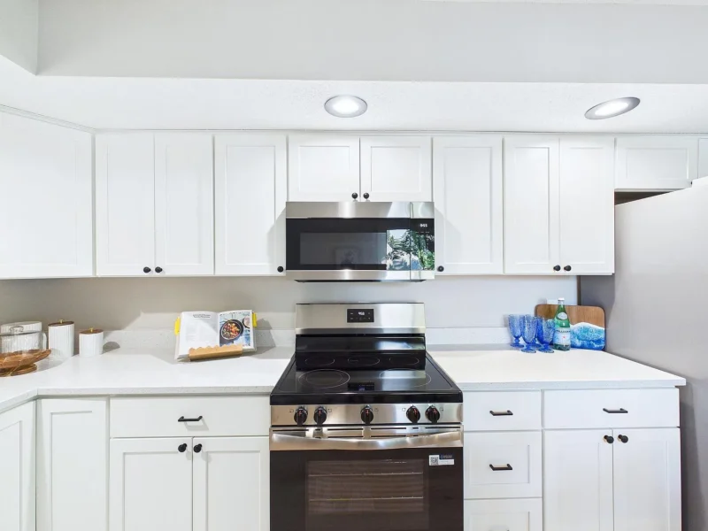 Kitchen with a gas range and microwave